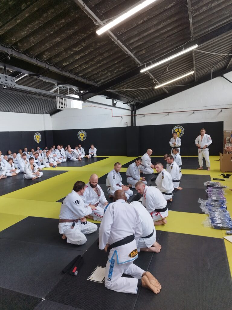 Students practise together during a Brazilian jiu-jitsu seminar.