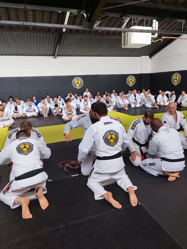 Students practise together during a Kaizen BJJ seminar.