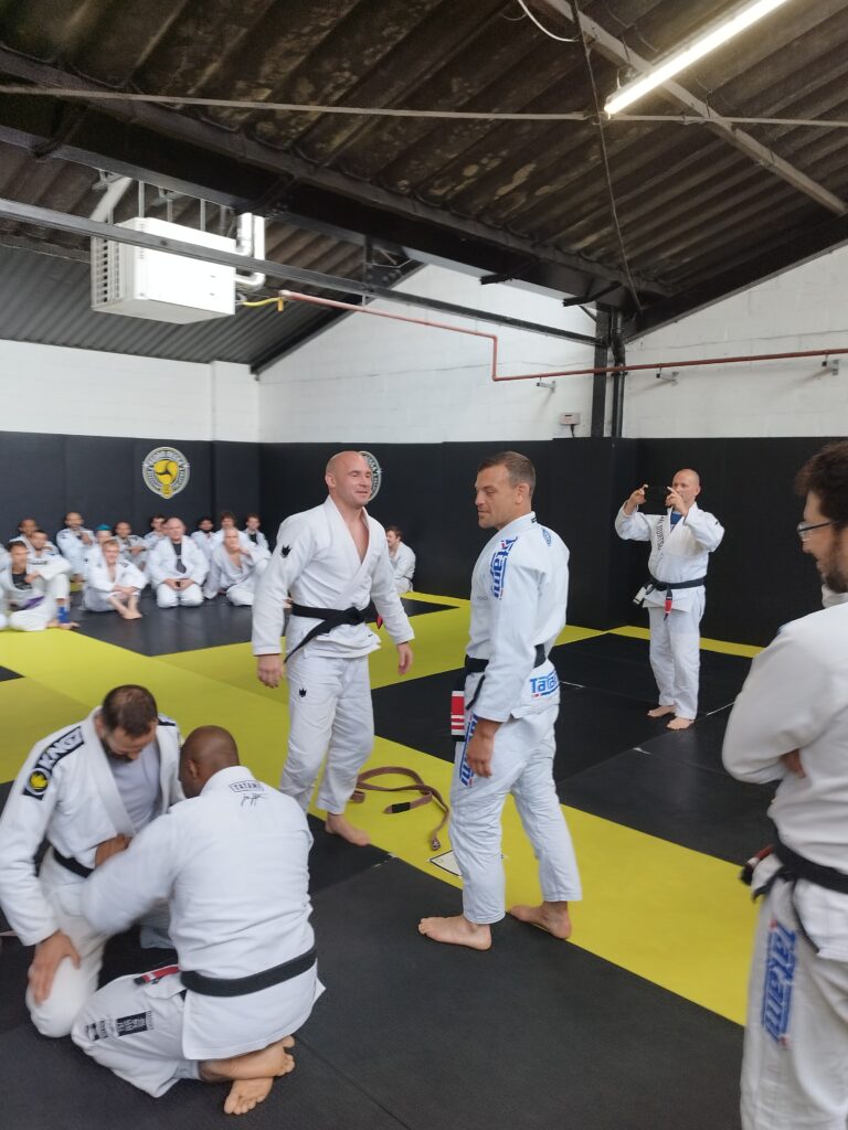 A group of students follows instruction during class.